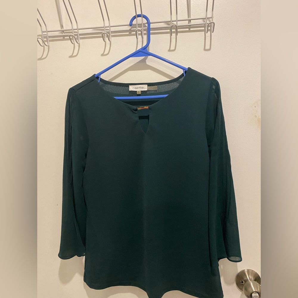 Beautiful top from Calvin Klein, XS but will fit to Small